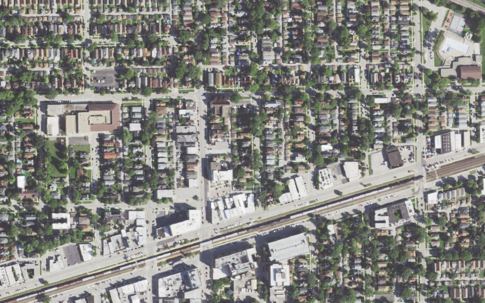 Real aerial of a Berwyn, IL neighborhood — a gutters contractor's service area, seen from above